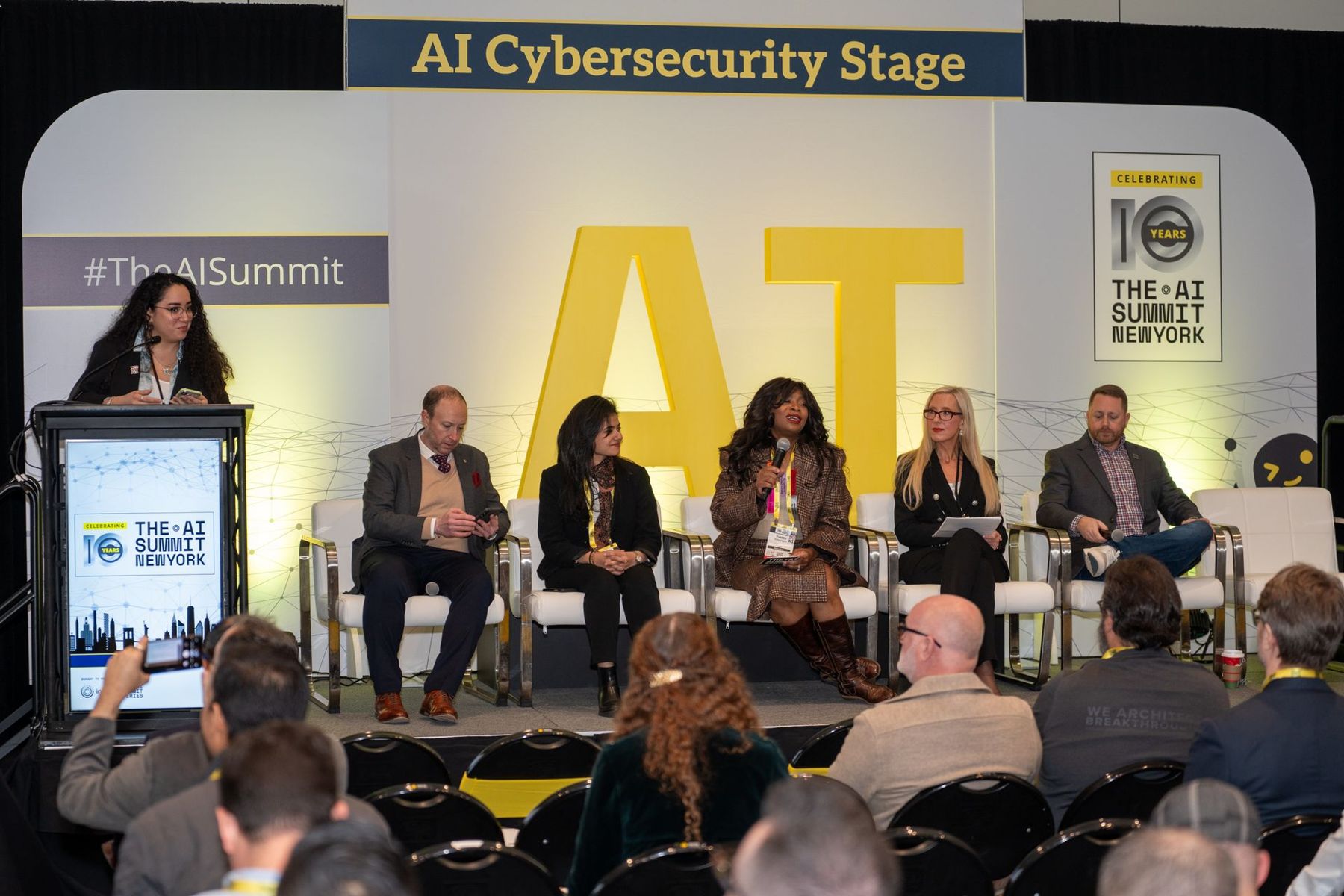 Yvette Schmitter on the AI Cybersecurity Stage panel at The AI Summit